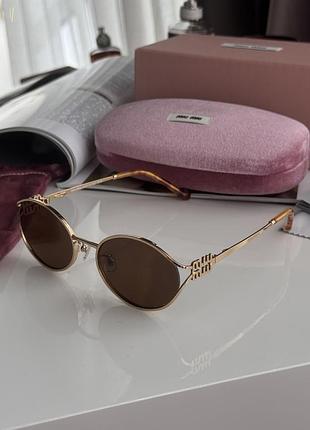 Очки миу-миу brown/gold smu52y miu fe09s 55/20/130