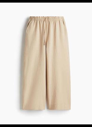 Шорти-кілоти , жіночі,uniqlo,колір бежевий, матеріал 50% бавовна 50% льон
