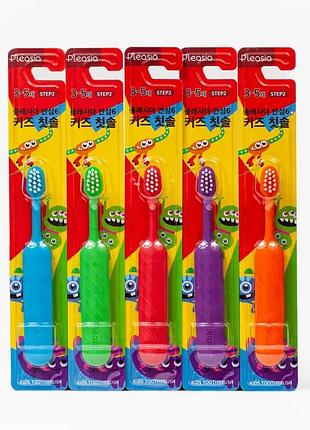 Зубная щетка pleasia kids step 2 in colour median