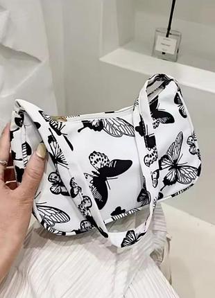 Сумка-багет через плече з 3d принтом метеликів .