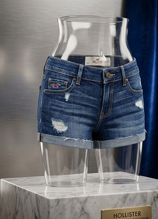 Женские джинсовые шорты hollister размер: us 1 / w 25 состав ткани: 99% хлопок цвет: синий с классическими контрастными рыжими швами