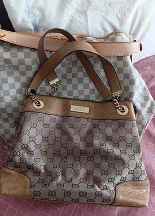 Сумка в монограммах gucci 3