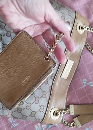 Сумка в монограммах gucci 8