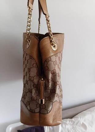 Сумка в монограммах gucci 4