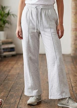 Стильные широкие спортивные штаны zara с эффектом клеш