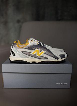 Кросівки new balance 204l grey/yellow