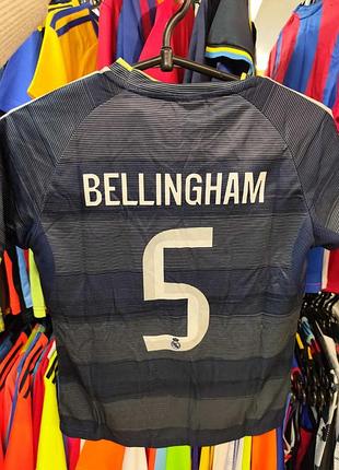 Форма футбольна дитяча з символікою футбольного клубу real madrid bellingham 5 гостьова 2026 темно-синій 125