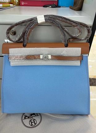 Блакитна жіноча сумка шкіряна з текстилем herbag 31 cm