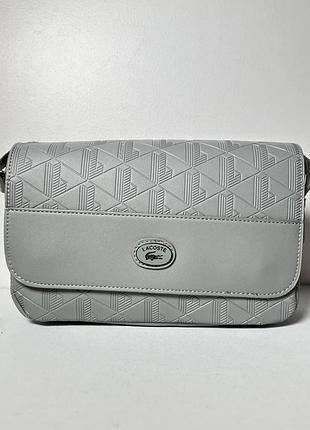 Сумка через плече lacoste monogram leather flap close satchel grey