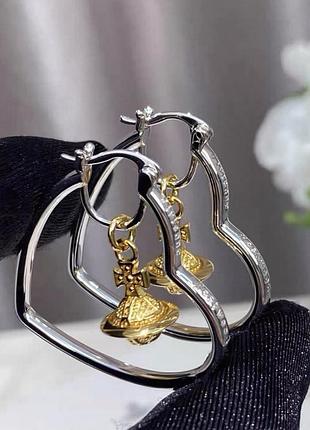 Сережки кільця у формі серця вівʼєн вествуд з планетою emily heart hoop