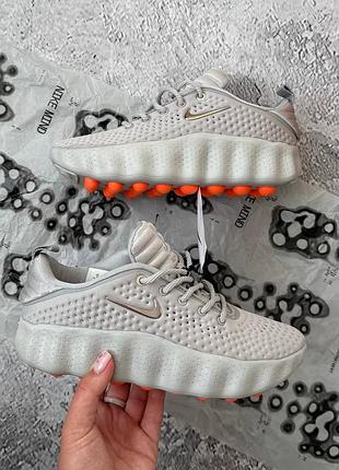 Стильные кроссовки nike mind 002 silver