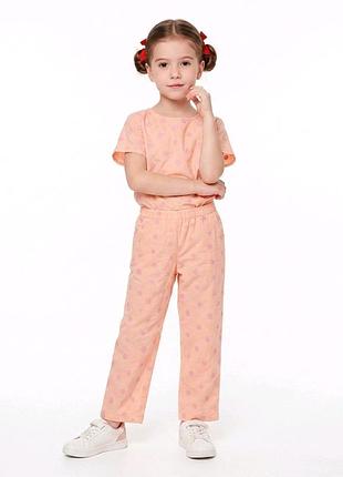 Штани персикового кольору з квітковою вишивкою 122-128 см (7-8y)