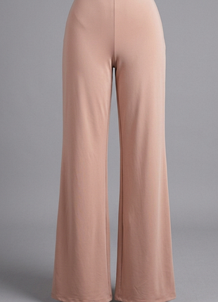 Бежевые широкие брюки из эластичной ткани. ohpolly