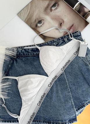 Жіночий білий бюстгальтер з чашками calvin klein lightly lined triangle 1