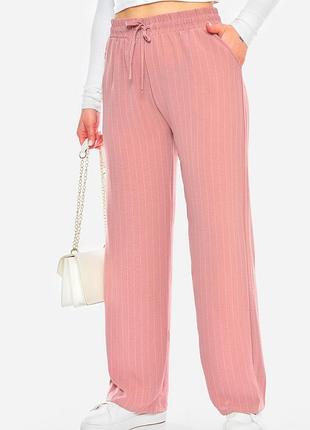 Штани жіночі рожевого кольору з принтом 199973k