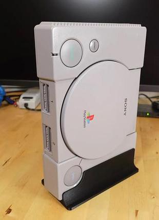 Вертикальный держатель для playstation 1 - надежная фиксация и экономия пространства! чорний