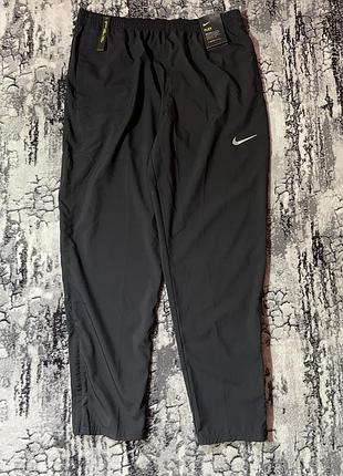 Нові штани чоловічі nike run stripe woven pant