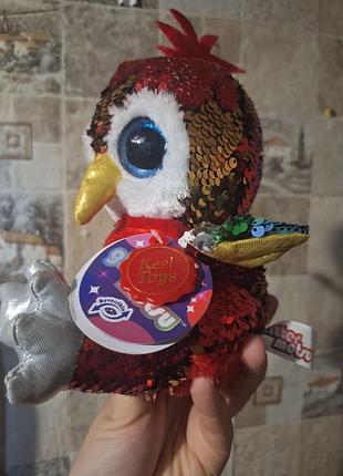 Це м'яка іграшка папуга rhea з колекції keel toys glitter motsu.