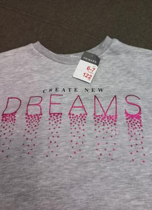 Сірий світшот primark із написом "create new dreams", прикрашеним рожевими стразами.