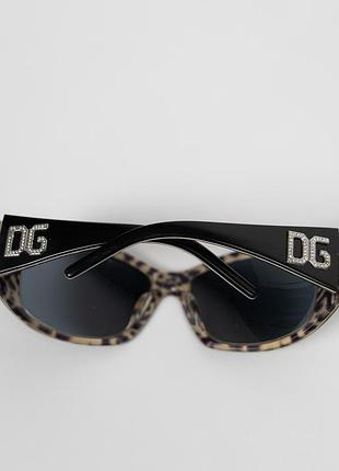 Оригінальні, сонцезахисні окуляри dolce & gabbana dg4007 560/87 у стильному дизайні з чорною оправою та леопардовим візерунком на внутрішній стороні д