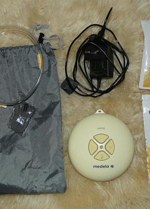 Швейцарский электронный двухфазный молокоотсос medela swing. оригинал + новые допы