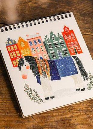 Блокнот sketchbook (квадрат.) кінь в засніженому місті