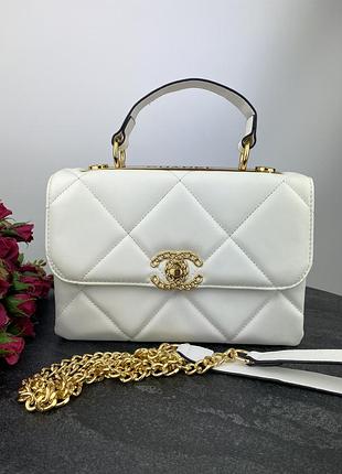 Жіноча сумка chanel white дефект потертість на лого, плями в середині