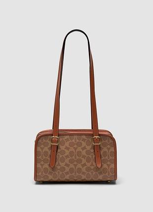 Жіноча сумка coach 1941 swing zip bag signature canvas 26 х 15 х 9 см