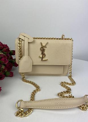 Жіноча сумка saint laurent beige дефект на шкірі (плями)