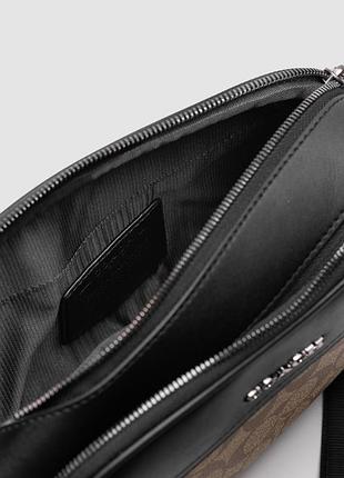 Мужская сумочка coach graham crossbody in signature canvas чёрная с бежевым 23 х 15 х 7 см