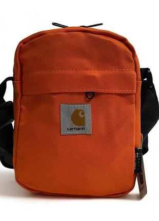Сумка через плечо carhartt jake shoulder pouch оранжевая