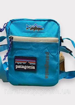 Сумка patagonia з патчем 21*16 блакитна