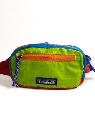 Поясная сумка patagonia ultralight black hole mini hip pack 1l салатовая