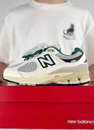 New balance 2002r pouch beige green