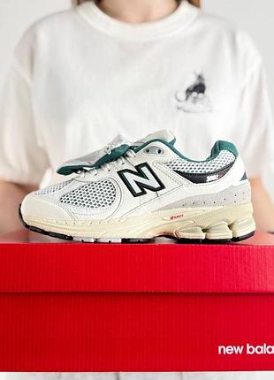 New balance 2002r pouch beige green
