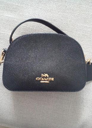Сумка жен.,бренд coach new york,цвет черный, размер высота 12см, ширина 16.5см, материал качественная экокожа или кожа (точной состав неведомый).