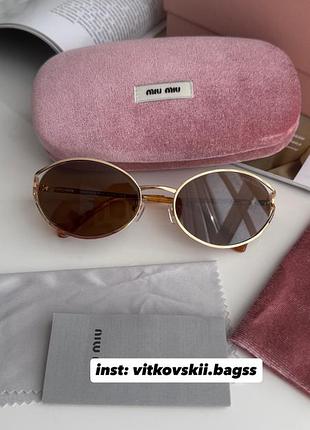 Сонцезахисні окуляри brown/gold smu52y fe09s😎