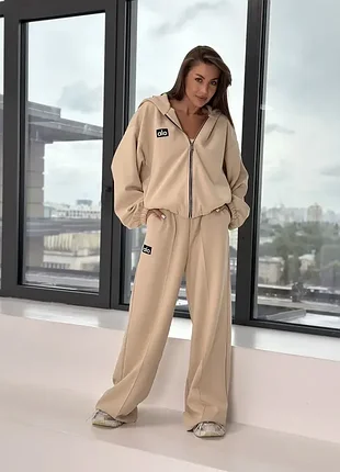Женский спортивный костюм oversize с капюшоном и широкими брюками