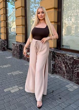 Брюки из льна - жатки. цвета: черный, белый, оранжевый, бежевый, голубой. размеры:50-52, 54-56,58-60.