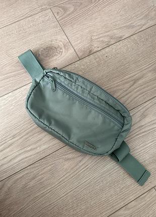 Сумка кросбоді levi’s мʼятного кольору
