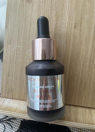 Revolution haircare rainbow drops у відтінку silver rays, що використовується для тимчасового фарбування волосся