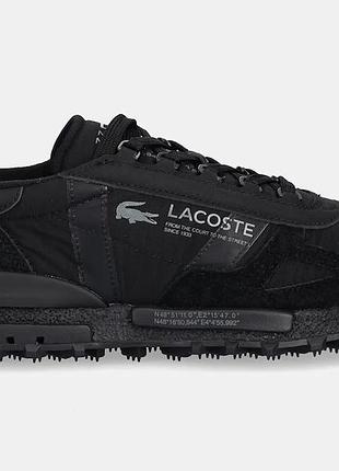 Мужские кроссовки lacoste elite active prm в черном цвете имеют характерный ретро-дизайн из комбинации нейлона и замши