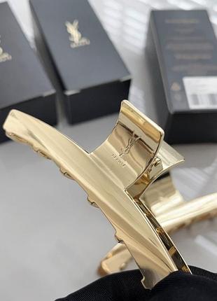 Представлено лімітовану металеву заколку-краб від бренду ysl beauty