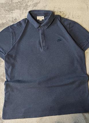 Поло lacoste в синьому кольорі