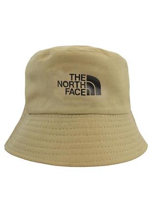 Панама з принтом the north face однотонна 55-58 бежевий