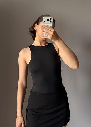 Чорне боді з високим горлом