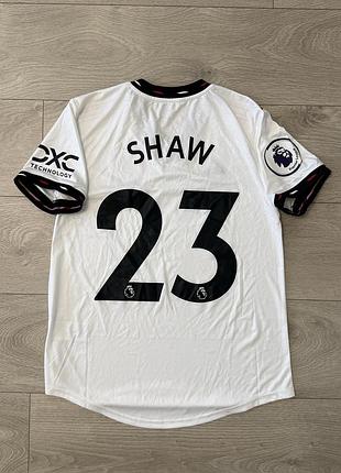 Жіноча футбольна джерсі адідас adidas manchester united 2022-23 away shaw 23, m, оригінал