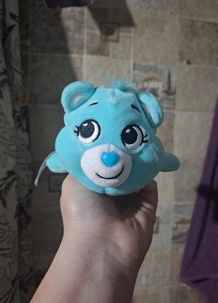 Плюшева іграшка схожа на блакитного ведмедика wish bear із серії care bears cutetitos.