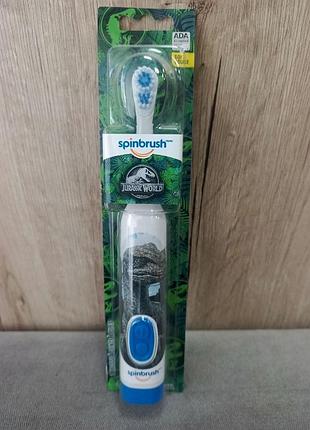 Дитяча електрична зубна щітка на батарейках бренду arm & hammer, модель із серії jurassic world.