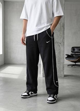Чоловічі спортивні штани nike в чорному кольорі